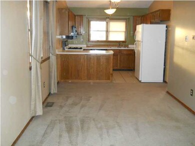 Living room view 2 into kitchen