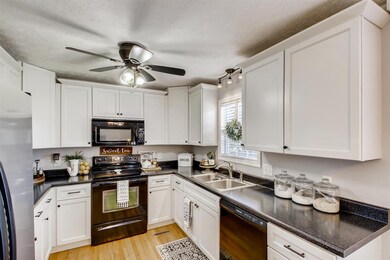 Kitchen has just been updated with new cabinetry and counter tops.