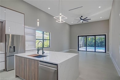 Kitchen with appliances with stainless steel finis