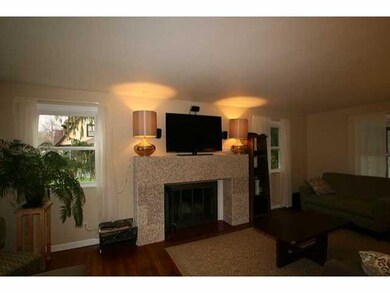 Living Room. The spacious living room offers hardw