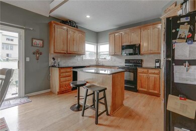 325 S Adams Ct, Raymore, MO 64083 - photo 4