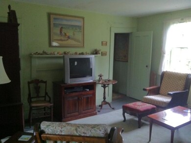 Just off the kitchen, this area now...