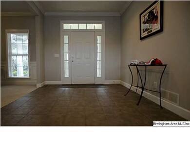 FOYER WITH HARDWOOD FLOORS