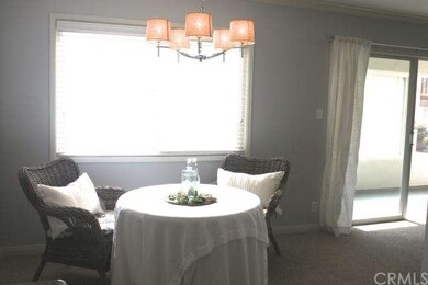 Cozy dining room with large window to bring in the