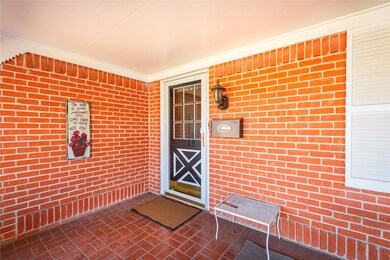 View of doorway to property and has a large covere