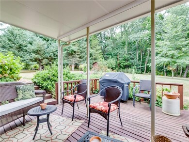 The back patio and porch that overlooks the neighb