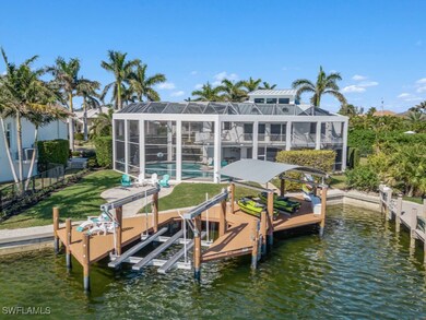 View of dock featuring a water view, a lanai, and