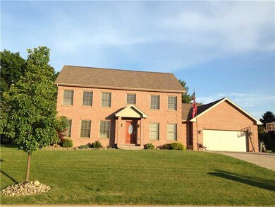 Exterior Front. 2- car attached garage with ample 
