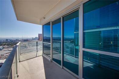 Balcony with a city view and a mountain view