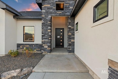 6915 E Chicken Hawk Loop, Nampa, ID 83686 - photo 2