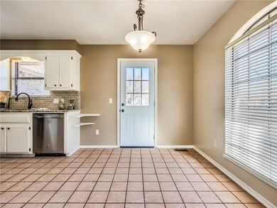 Large Breakfast Room with new exterior door that l