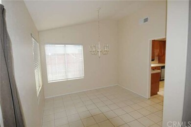 Dining Room is light and bright and has neutral ti