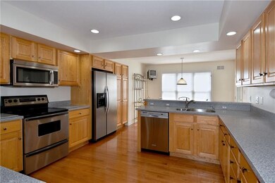 Large eat-in kitchen has tons of cabinetry, solid 