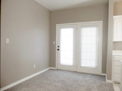 dining room and kitchen with an open floor plan 