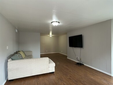 sectional sofa w/decorative pillows, wall-mounted