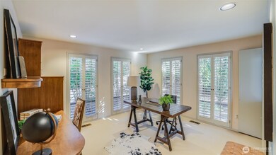 Jack-and Jill bar connecting the living room and office. Could easily change into another bedroom on the main floor.