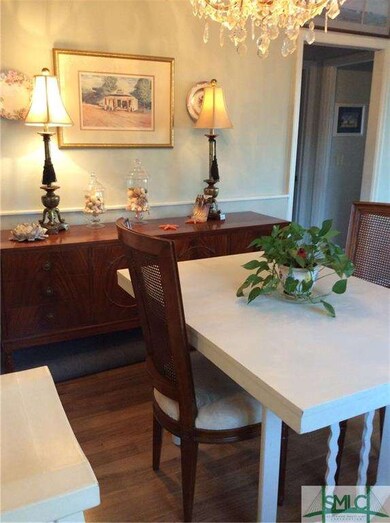 dining area that is open to kitchen and views of r