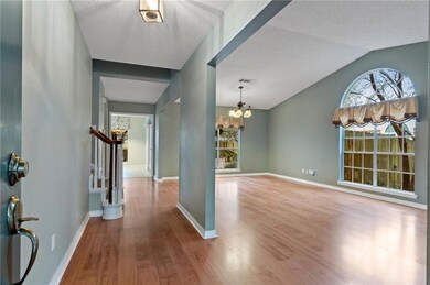 Entrance to home from front door. Notice vaulted c