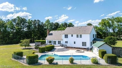 Back yard with pool view of home