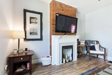 Living room with exposed brick