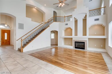 great room fireplace and wood floor