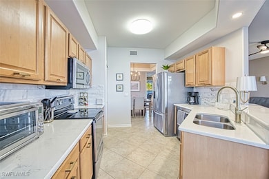 Kitchen featuring visible vents, light brown cabin
