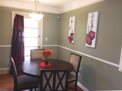 The Dining Room opens to a three-season Sun Room w