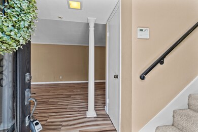 Tile Wood floor throughout bottom floor.