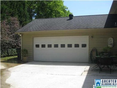 Two car convenient entrance garage on back of hous
