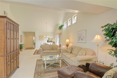 LIVING ROOM; DINING ROOM; FOYER; VAULTED CEILING; 