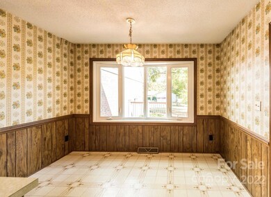 Large breakfast room that overlooks beautiful level backyard!  