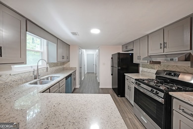 7156 Whitfield Dr, Riverdale, GA 30296 - photo 7