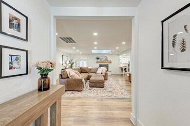Living area featuring light wood finished floors,