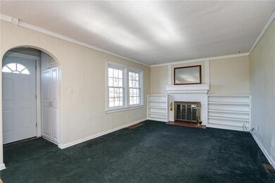 Front Living Room w/Fireplace and Built-ins. Main 