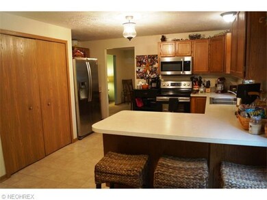 OPEN CONCEPT KITCHEN INTO THE FAMILY ROOM  FEATURE