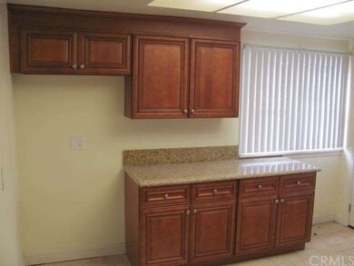 MOR KITCHEN CABINETS WITH SPACE FOR FULL SIZE REFR
