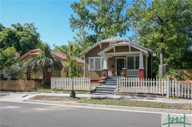 White picket fence around the front yard.
