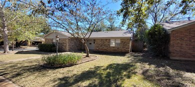 Large corner lot with side entry garage.