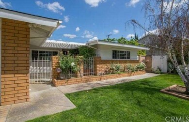 The immaculate, freshly painted exterior and private gated courtyard add to the appeal of this truly special home.