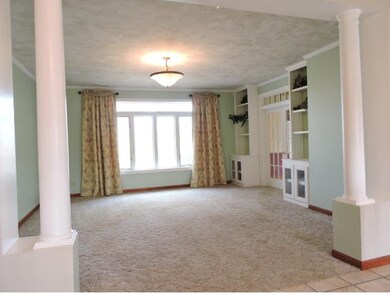 From the foyer, you can see the fabulous living ro