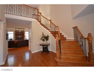 Foyer - Grand 2-Story Foyer with Wood Floors & Des
