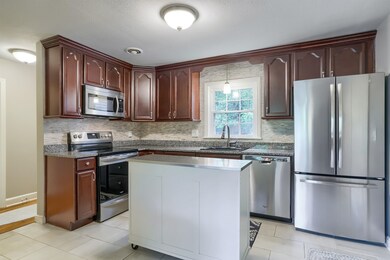 There is no shortage of cabinet space in this beau