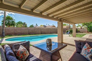 Covered Patio with Sparkling Pool