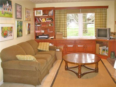 FAMILY ROOM WITH WOOD FIREPLACE