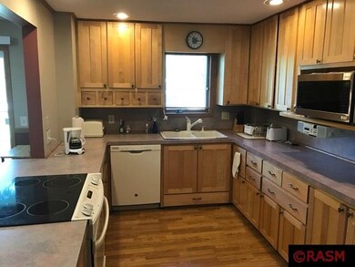 WITH MAPLE CABINETS