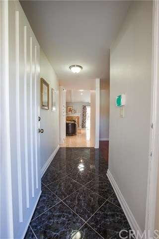 Front entryway with gorgeous black tile work. 