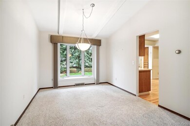 Dining Room w/bay window, looks out to the private