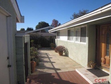 The route from the side garage door to the front d