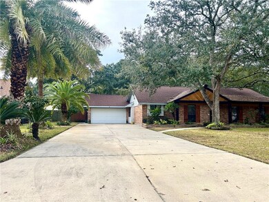 Long driveway provides ample parking.