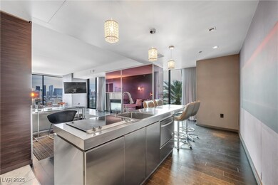 Kitchen featuring a spacious island, wood finished